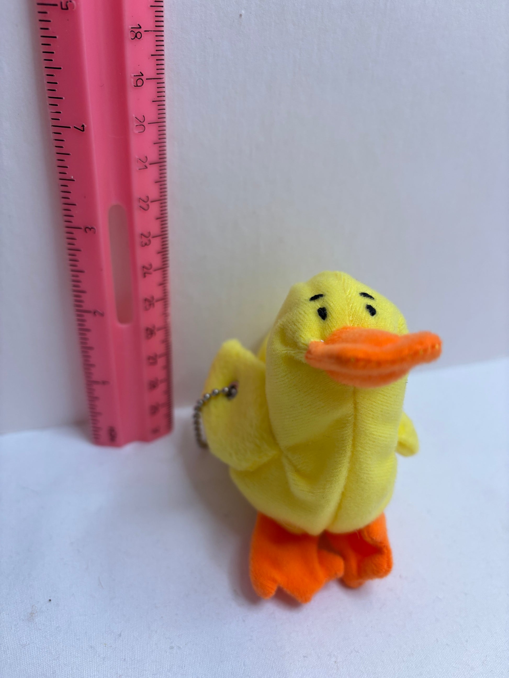 yellow duck orange feet and beak plush bag charm