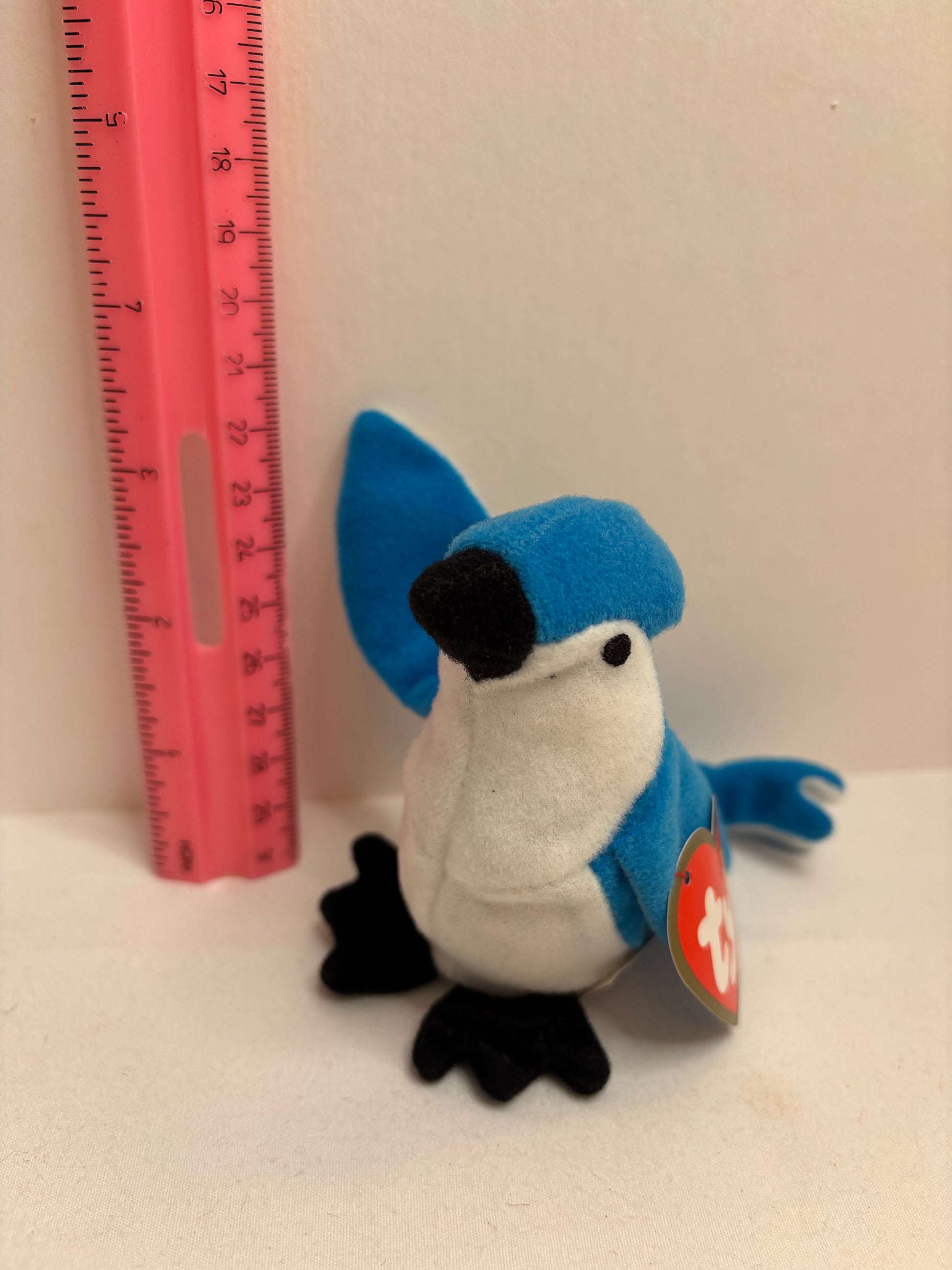 blue and white bird plush bag charm