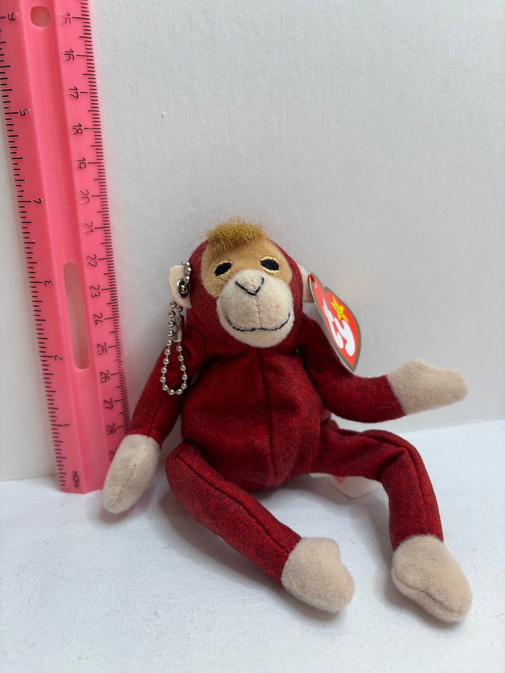 maroon orangutan plush bag charm