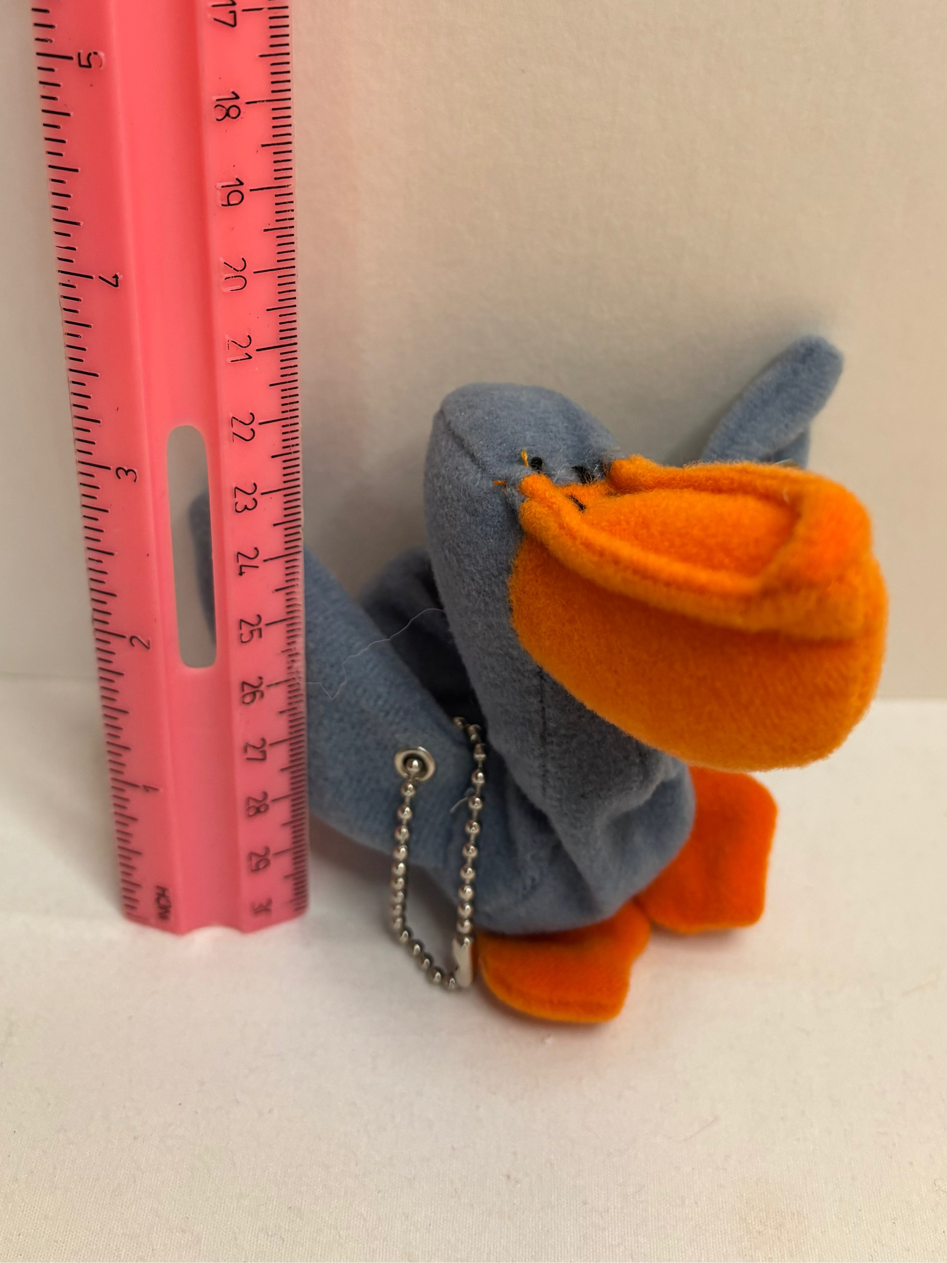 gray pelican orange beak plush bag charm