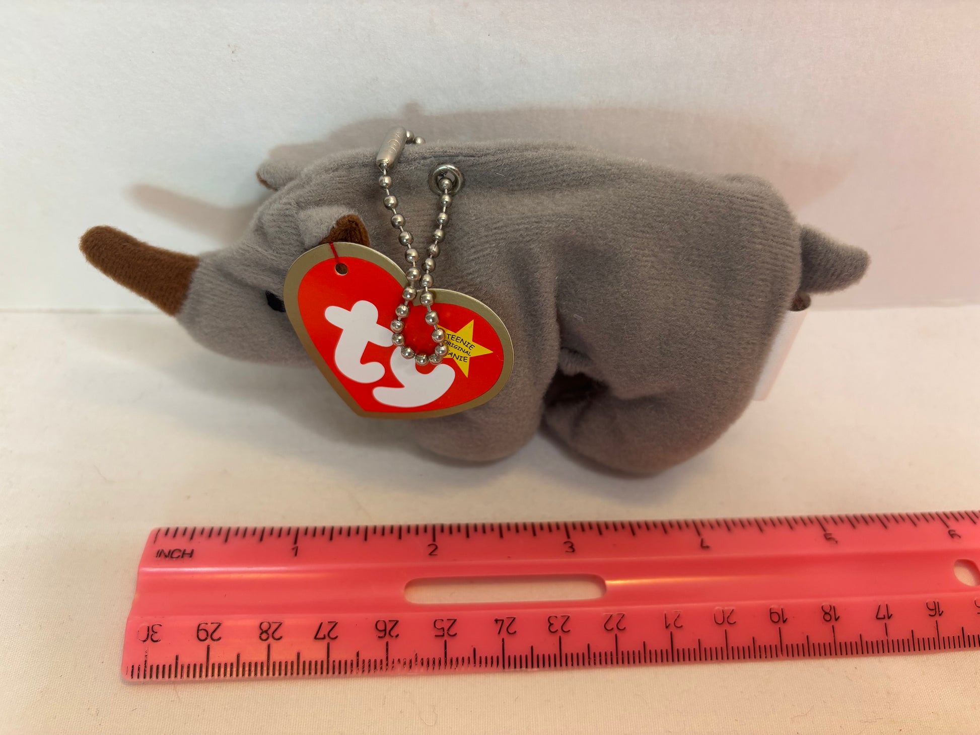 grey and brown rhinoceros plush bag charm
