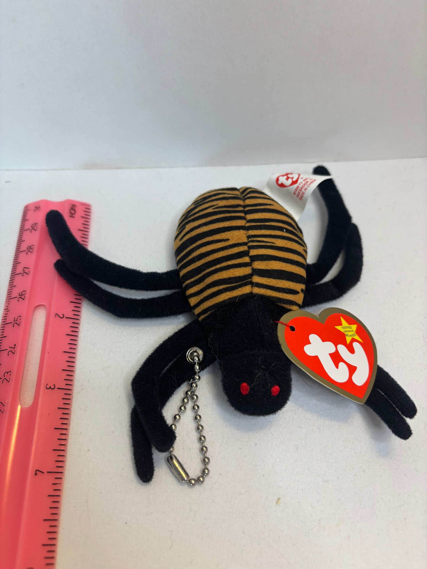 black striped spider plush bag charm