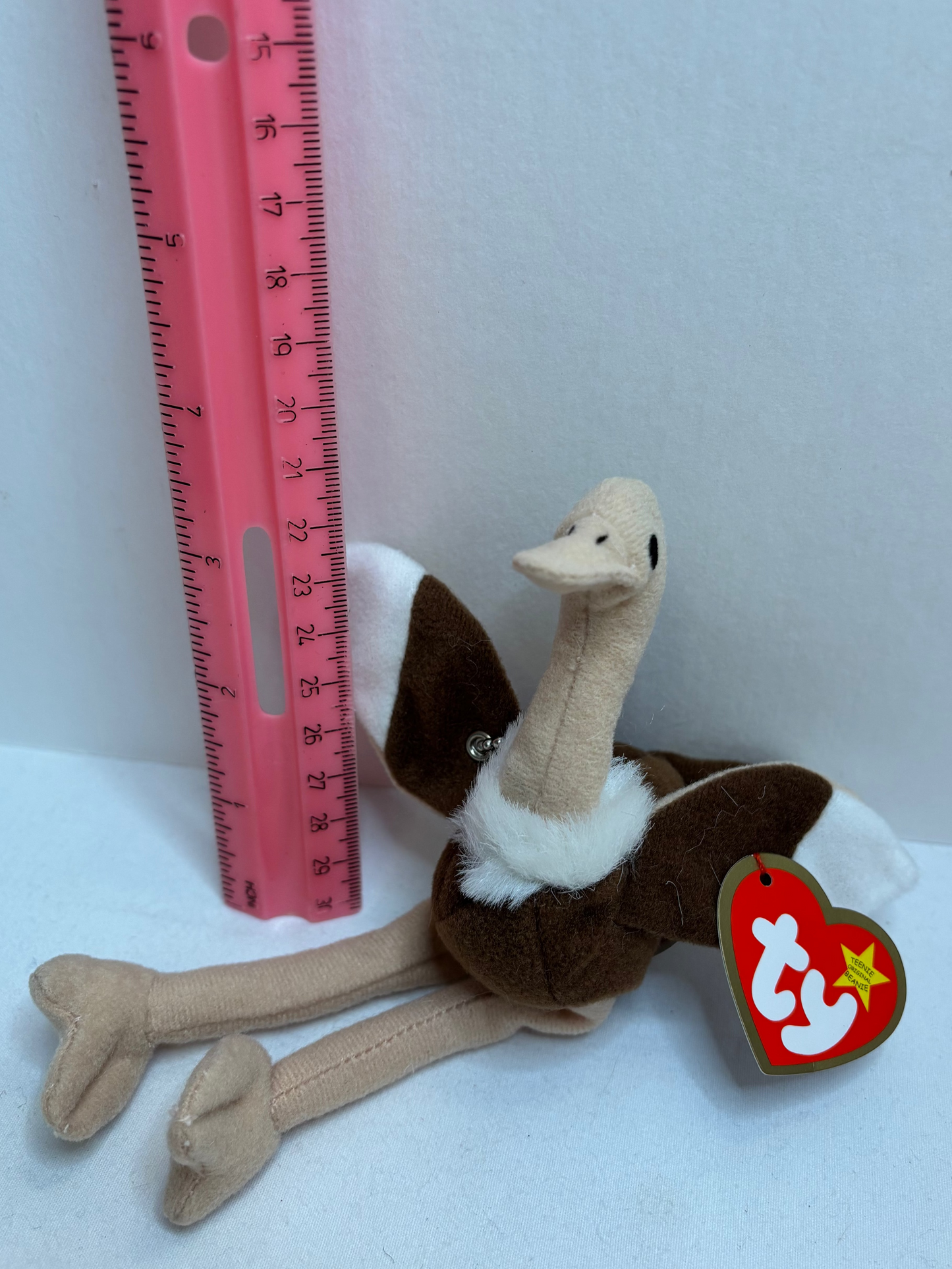 brown tan and white ostrich plush bag charm